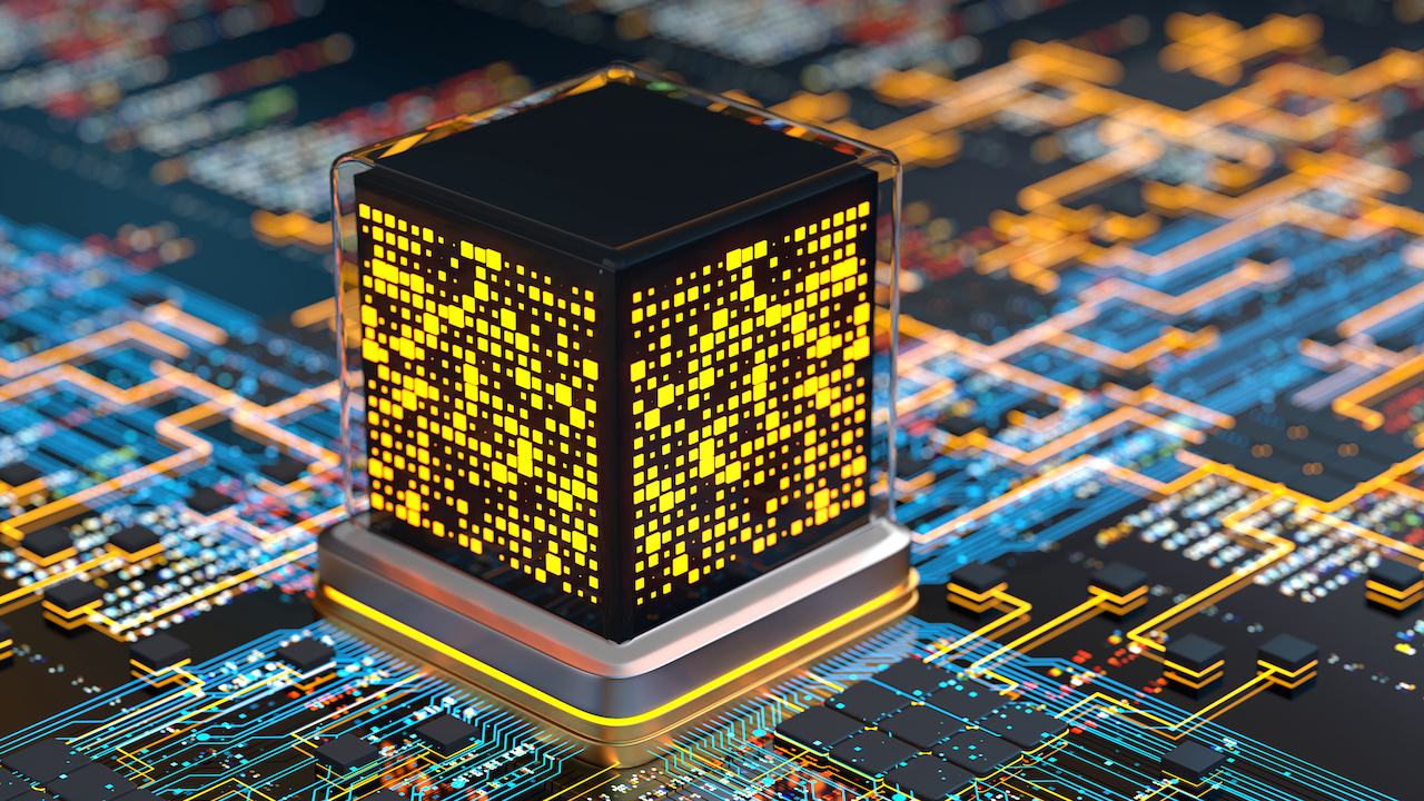 A quantum chip with glowing yellow squares on a dark blue circuit board.