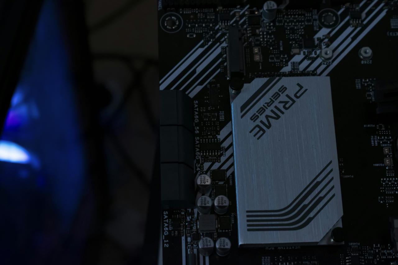 A computer motherboard is displayed with light.